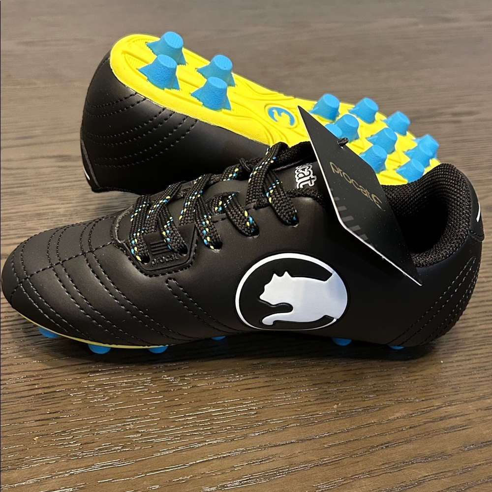 Puma Black Soccer Cleats with Blue and Yellow Accents